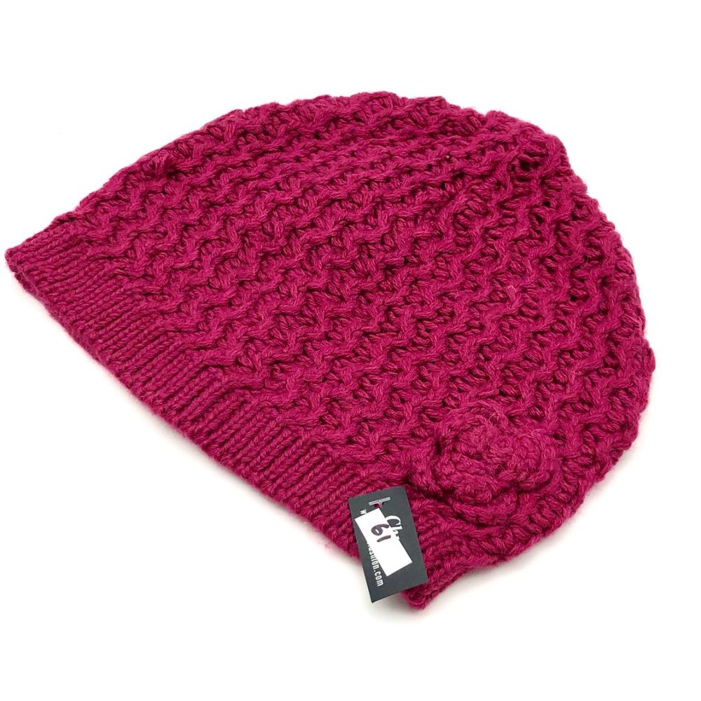 Girls pink knitted hat with rose